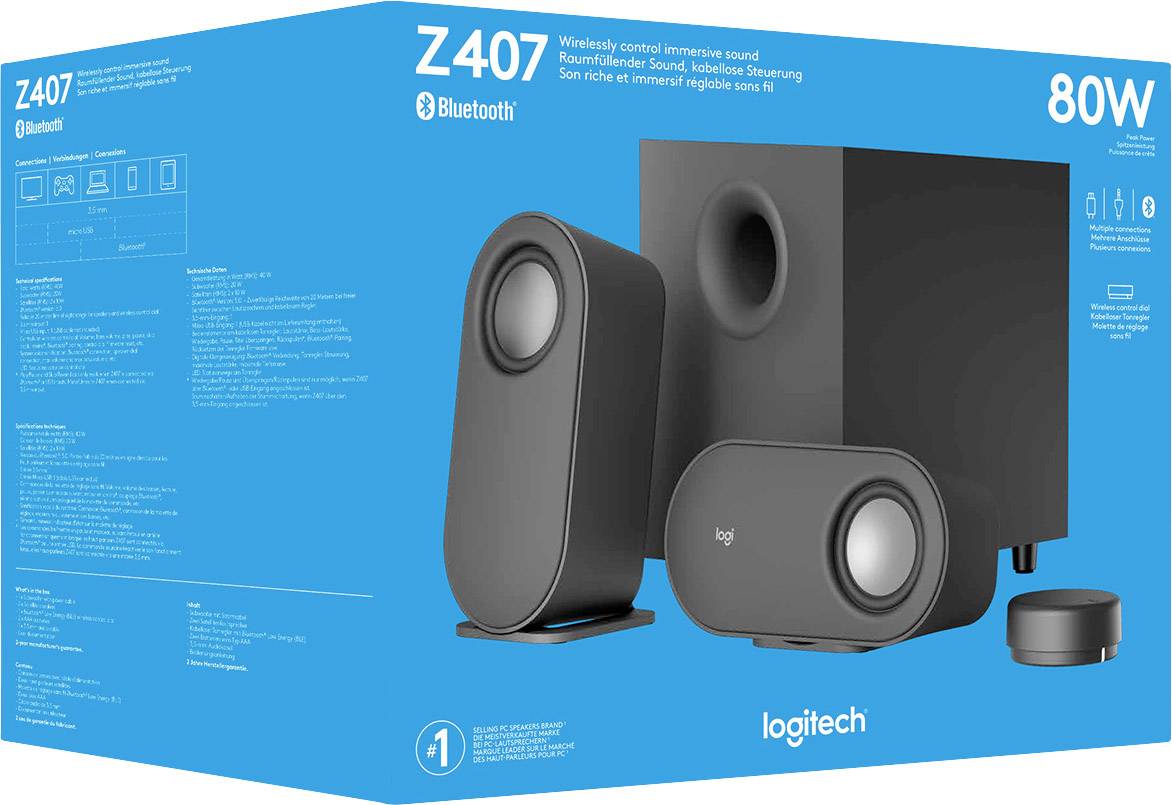 Zvočni sistem Logitech Z407, ki sestoji iz dveh zvočnikov, subwooferja in brezžičnega krmilnega obročka, na modri embalaži.