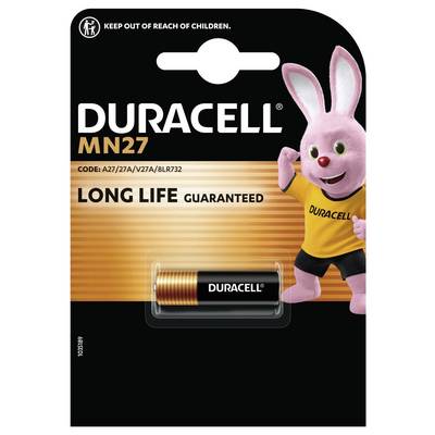 Duracell MN27 baterija v embalaži s priljubljenim roza zajčkom. Besedilo pravi »Dolga življenjska doba garantirana.« Baterija je prikazana pod maskoto.