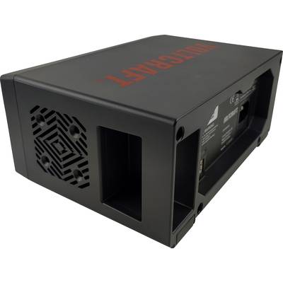 Črna elektronska naprava z ventilacijskimi režami ob strani in rdečim napisom 'VOLTCRAFT' na vrhu.