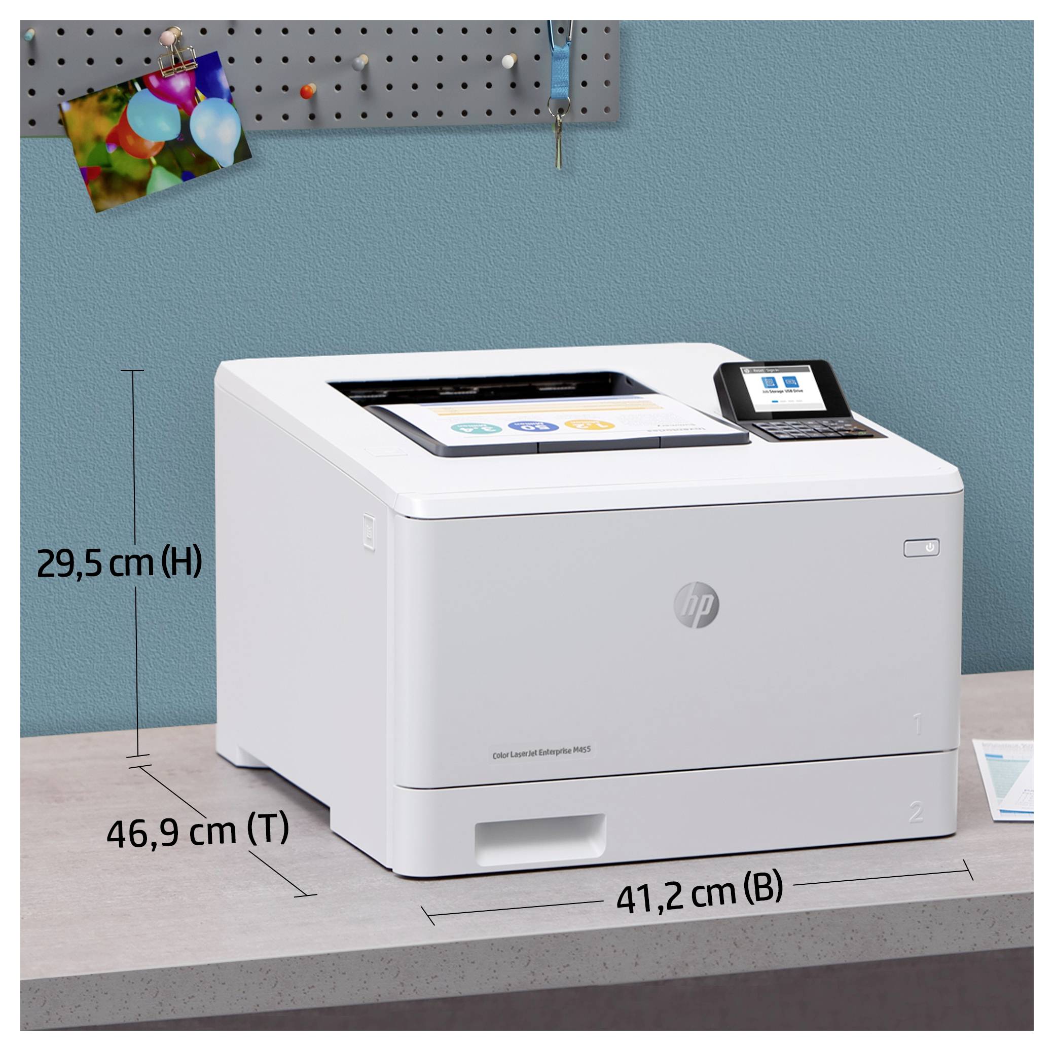Bela tiskalnika HP Color LaserJet na mizi, ki prikazuje dimenzije 46,9 cm globine, 41,2 cm širine in 29,5 cm višine.