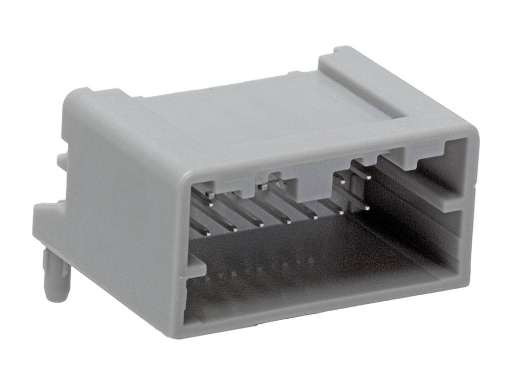 Siv, pravokoten plastični priključek z več kovinskimi povezavami v notranjosti. Primeren za elektronske naprave.