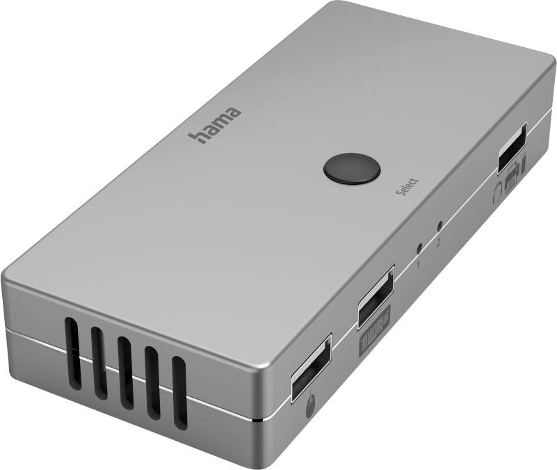 Srebrna, pravokotna naprava z več priključki, vključno z USB- in HDMI-vrati, ter velikim gumbom na vrhu.