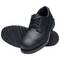 Črn usnjeni čevelj z brogue detajli in debolo gumijasto podplat, ki deluje elegantno in robustno.