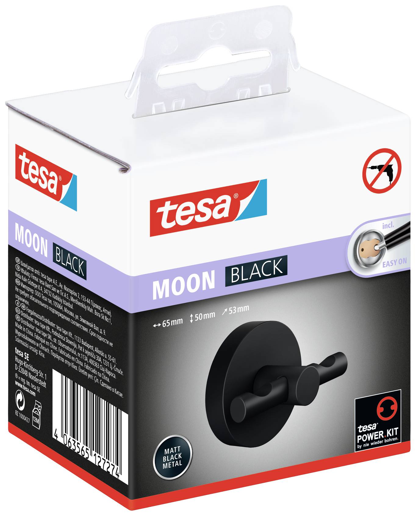 Črni stenski obešalnik 'Moon Black' znamke tesa, montaža brez vrtanja. Mat površina, premer 65 mm. Embalaža prikazuje sliko izdelka.