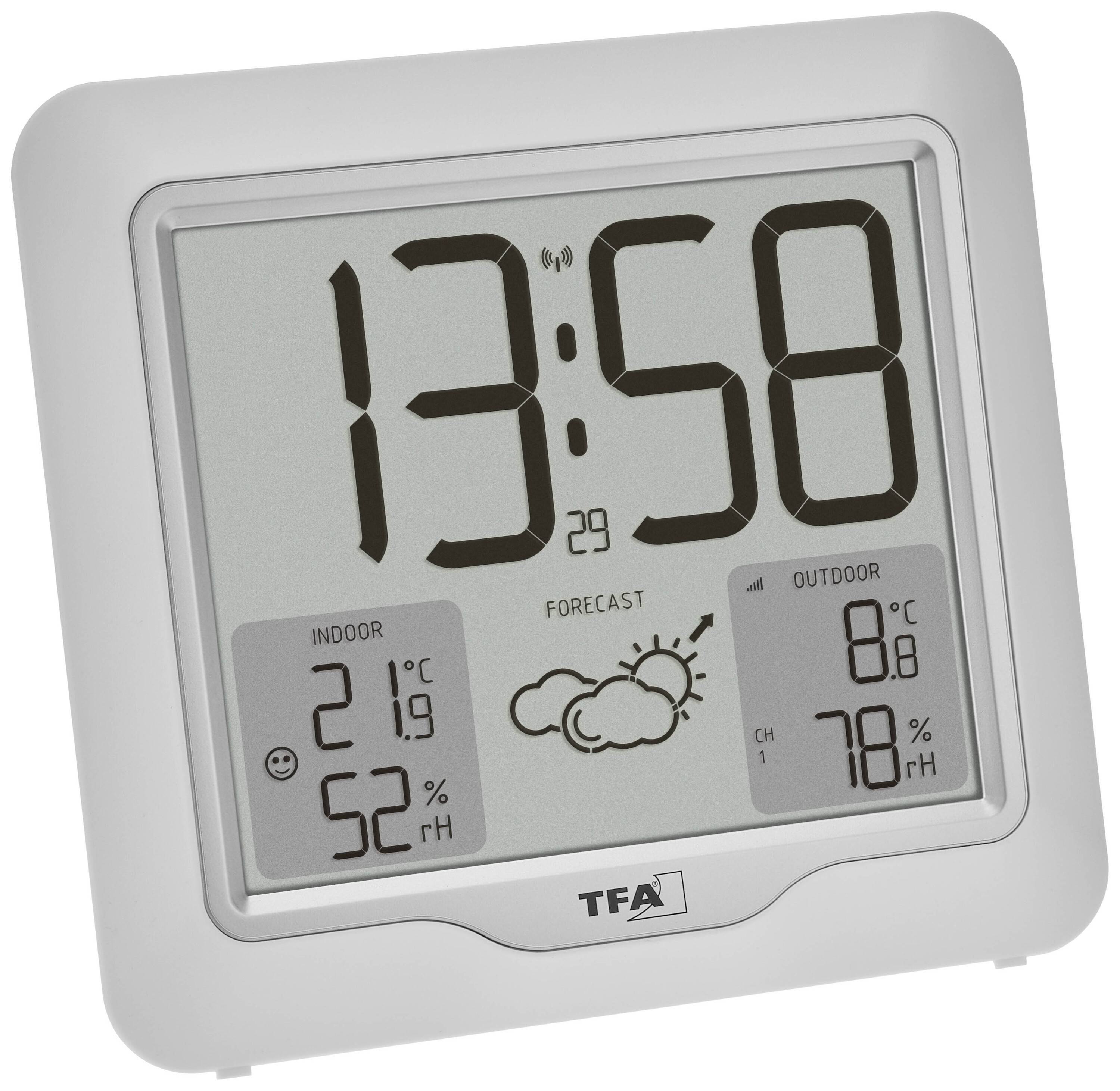 Digitalni termometer z prikazom časa '13:58'. Temperatura prostora 21°C, zunanja temperatura 8°C, notranja vlažnost 52%, zunanja vlažnost 78%. Simbol vremenske napovedi z oblaki in sončnimi žarki.