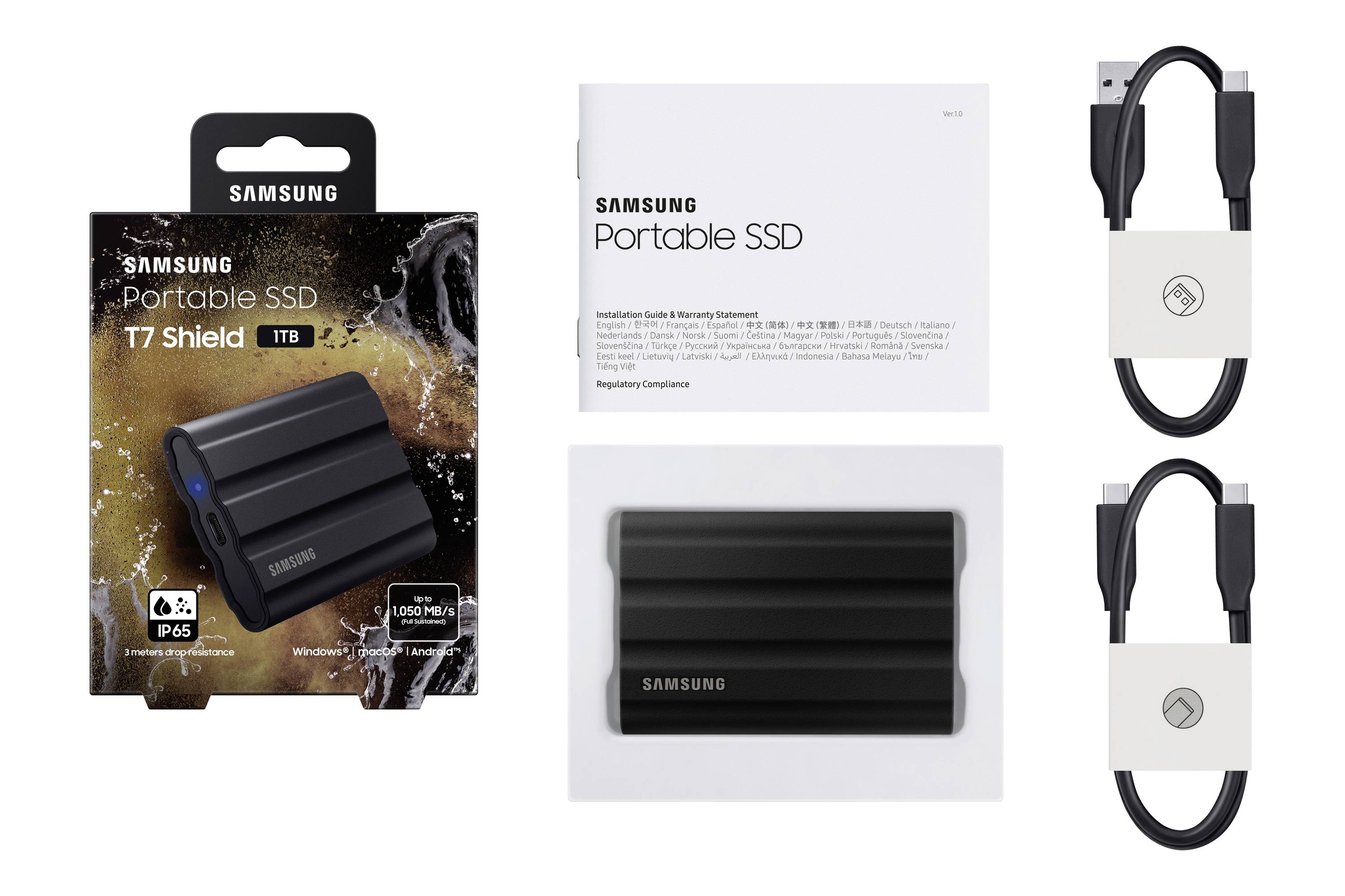 Embalaža Samsung Portable SSD T7 Shield s 1TB zmogljivostjo, opremljena z USB kablom in navodili za uporabo.