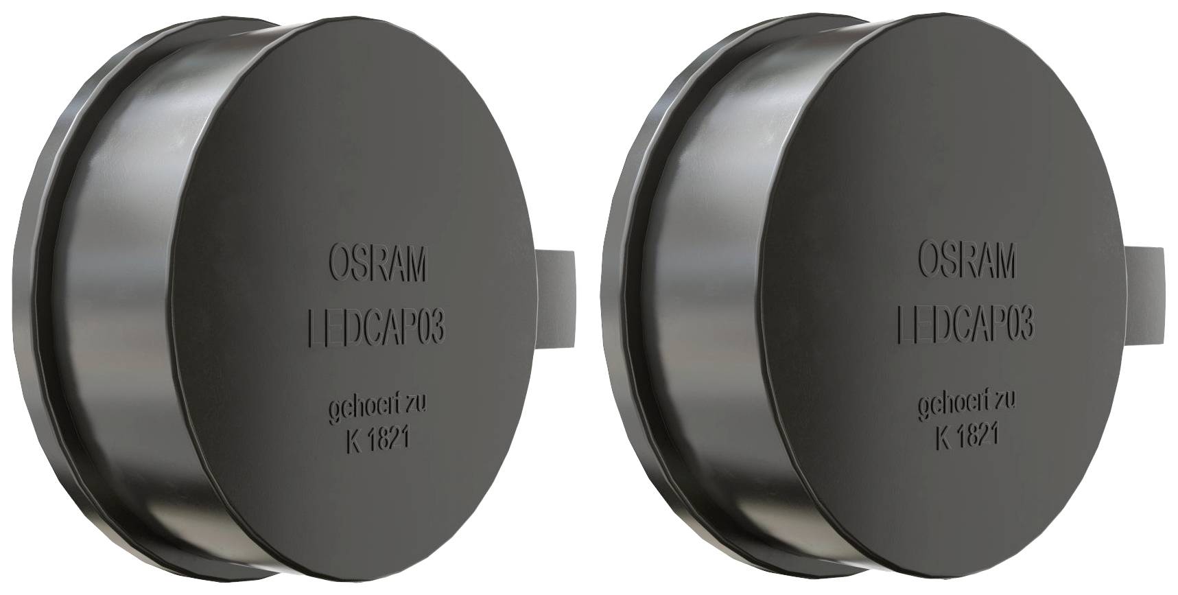 Dva identična okrogla črna predmeta z napisom 'OSRAM LEDCAP103 zavrtena v K1821'.