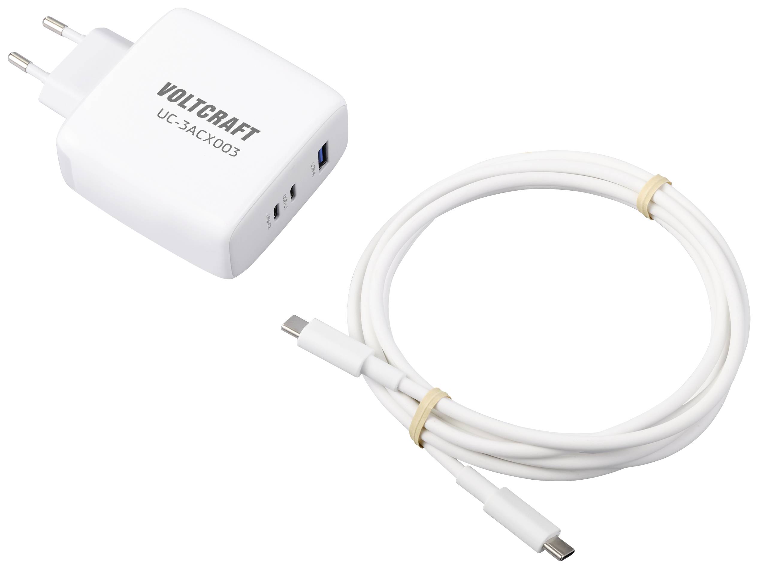 Polnilec z napisom 'Voltcraft UC-3AC4003' in USB kablom prikazujeta opremo za polnjenje.
