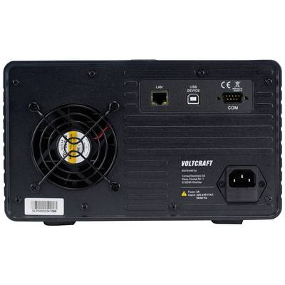 'Zadnja stran naprave z ventilatorjem, priključki LAN in USB ter priključkom za napajanje. Vidno blagovna znamka 'Voltcraft' in nadaljnji tehnični podatki.'