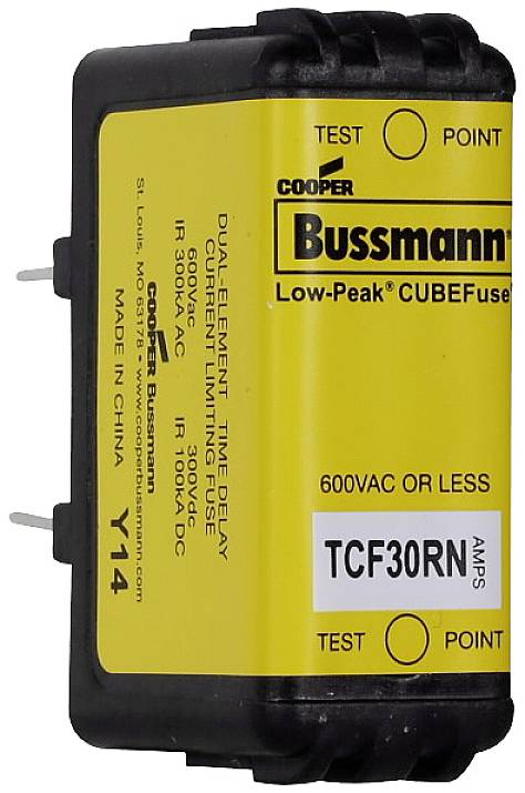 Rumeno Bussmannovo varnostno modul z napisom 'Low-Peak CUBEFuse' in specifikacijami za napetost ter amperažo.