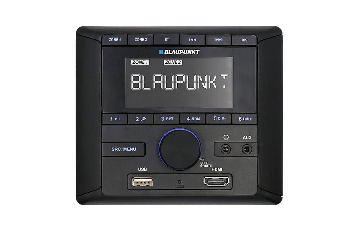 Črn avtoradio znamke Blaupunkt z regulatorji in priključki. Na zaslonu prikazuje napis 'Blaupunkt'. Opremljen z USB- in HDMI-priključkoma.