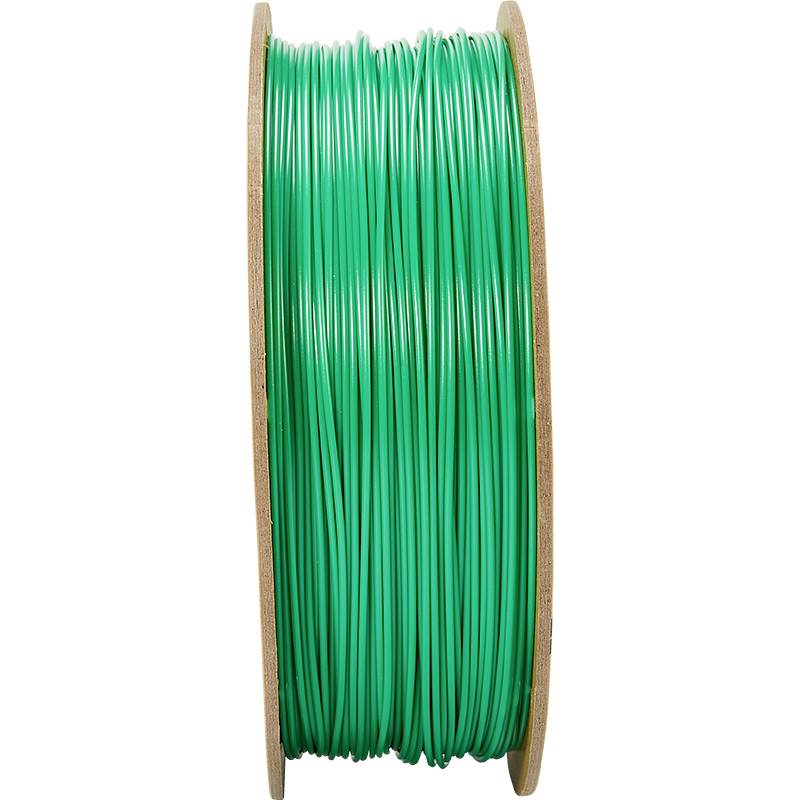 Kolut zelenega filamenta, verjetno primernega za 3D-tiskanje. Filament je navit na leseni tuljavi.