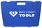 Moder kovček z napisom 'BRILLIANT TOOLS'.
