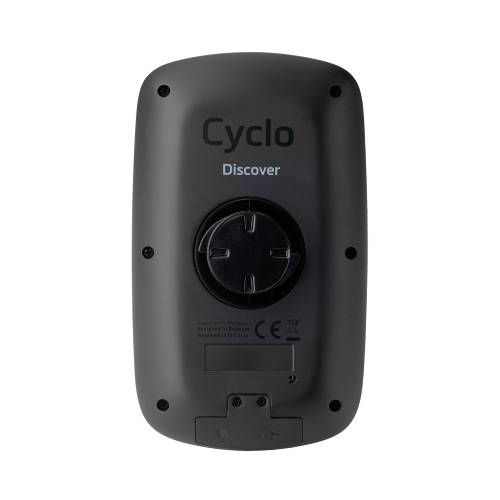 Pogled od zadaj naprave z napisom 'Cyclo Discover', okroglim priključkom na sredini in CE-znakom spodaj.