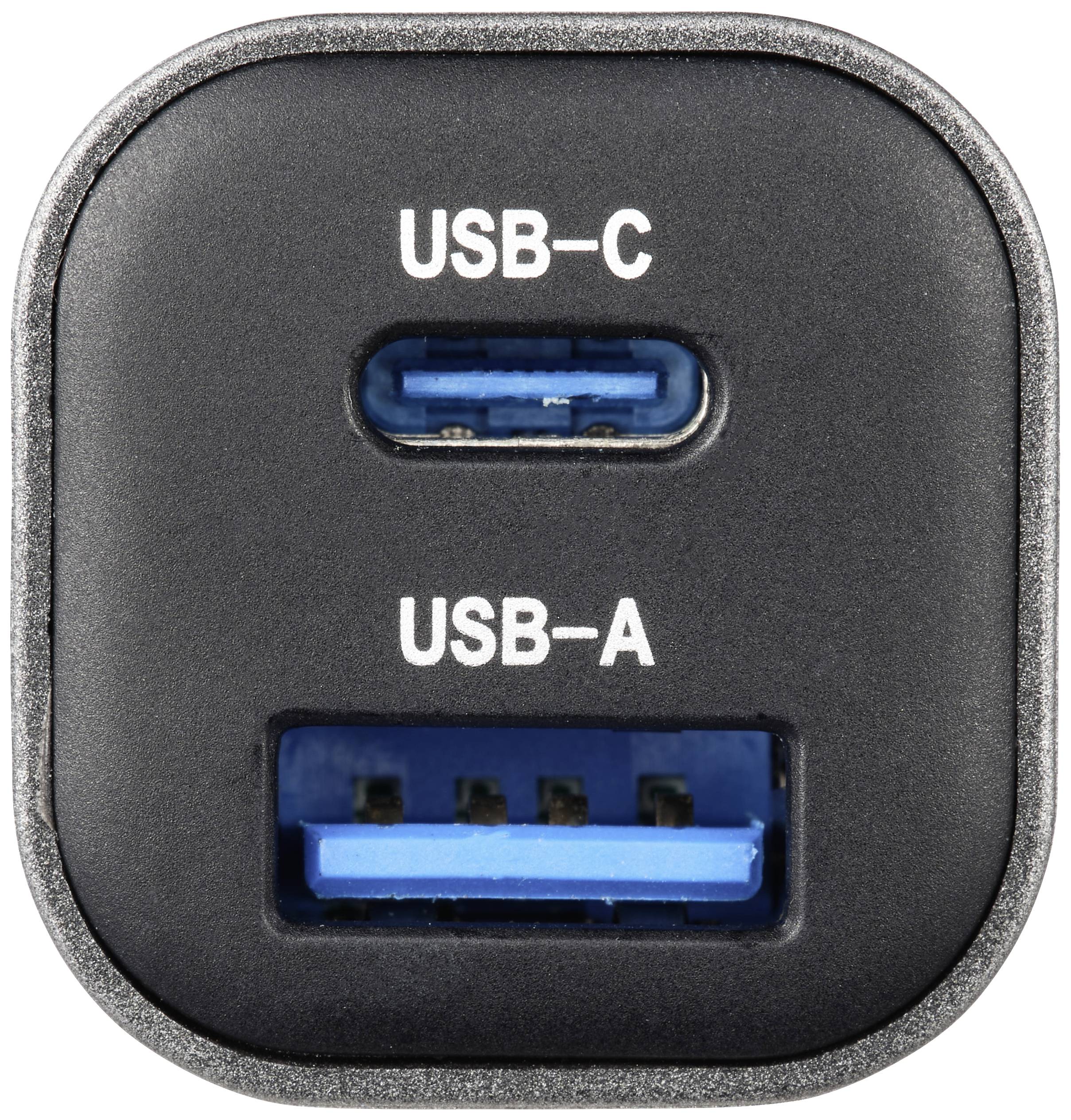 'Bližnji posnetek polnilnika z dvema priključkoma, USB-C in USB-A, oba označena. USB-C priključek je zgoraj, USB-A spodaj.'