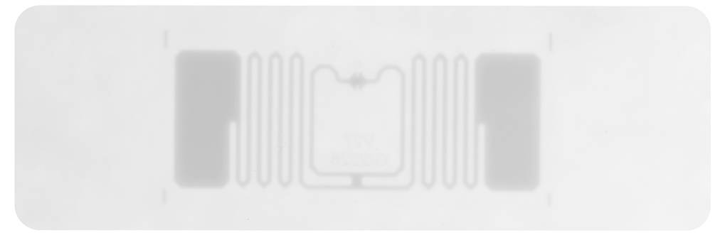 RFID-oznaka v pravokotni obliki z vidnimi elektronskimi vezji.