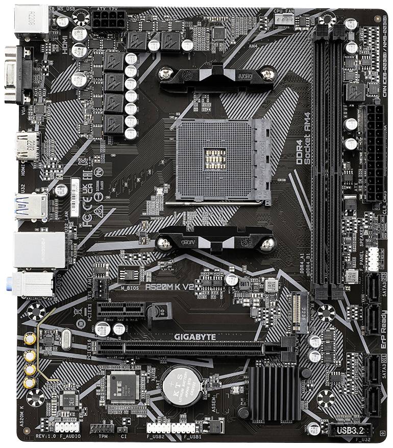 Črna matična plošča z različnimi režami in priključki. Napis prikazuje 'GIGABYTE' in specifikacije za DDR4 RAM.