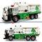 Lego model električnega smetarskega vozila z reciklažnimi simboli in napisom 'Mack Electric', ki prikazuje okolju prijaznost.