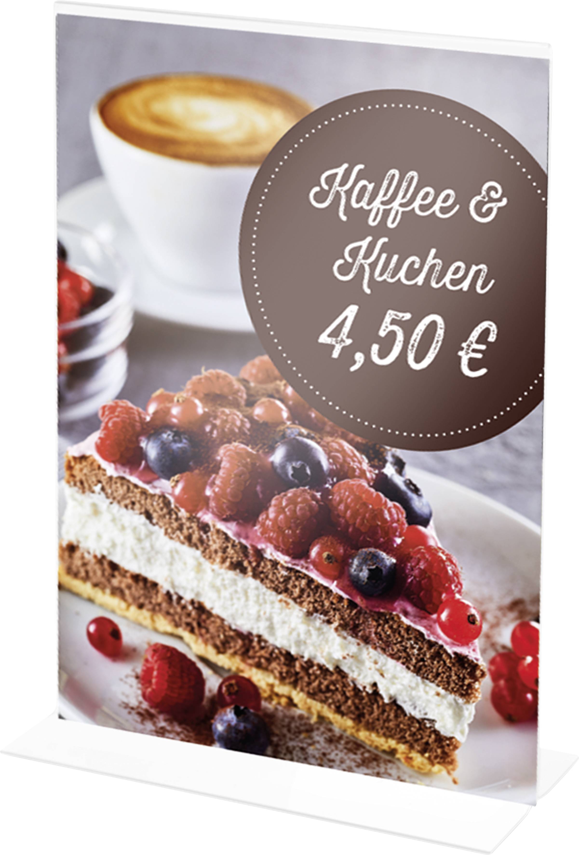 Namizni reklamni nosilec s skodelico kapučina in koščkom jagodne torte. Besedilo: 'Kava in torta 4,50 EUR'.