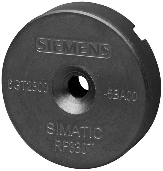Pogled spredaj okroglega, črnega Siemens SIMATIC RF380T objekta s centralnim odprtinom, serijsko številko in modelno številko.