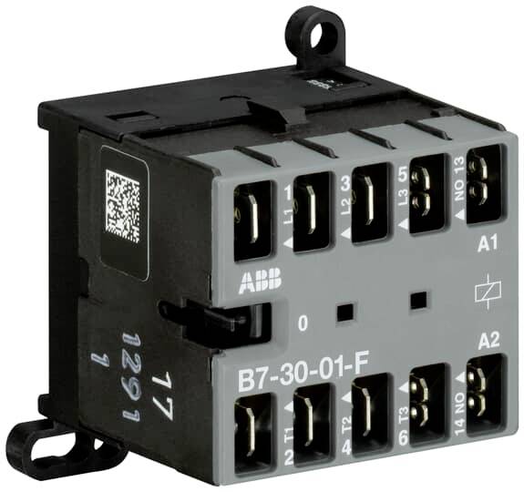 Električni kontaktor B7-30-01-F z več priključnimi sponkami in oznakami. Glavne komponente za električna vezja.