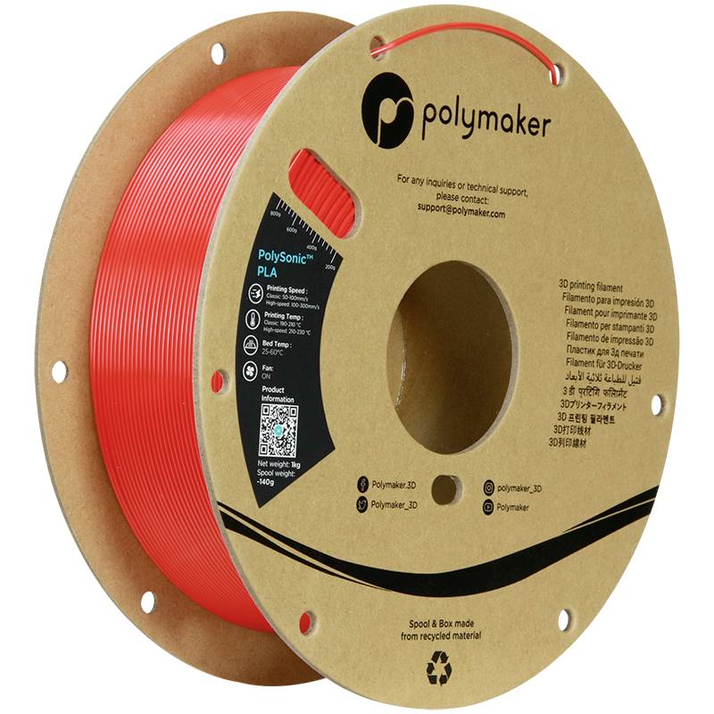 Kolut rdečega 3D-tiskalnega filamenta znamke 'Polymaker'. Škatla prikazuje informacije in kontaktne podatke proizvajalca.