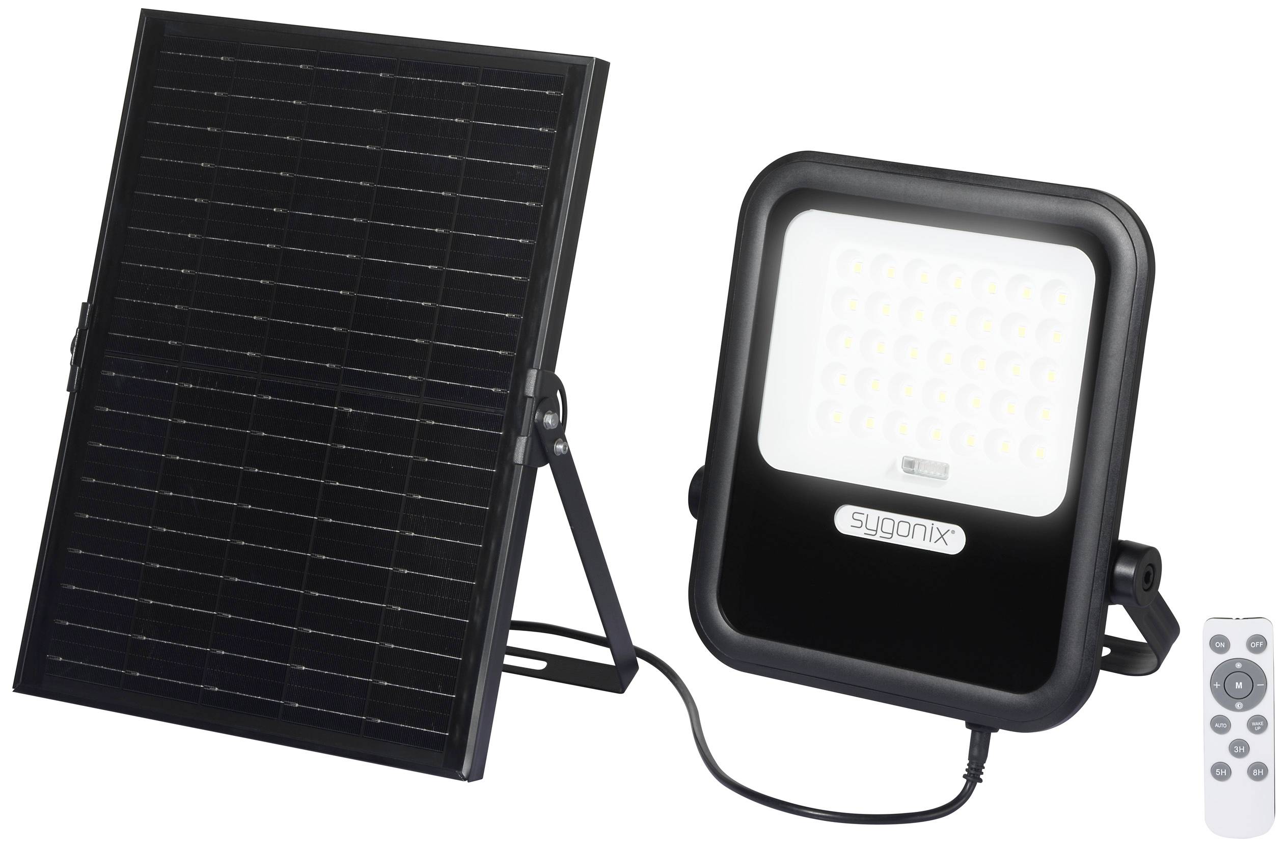 Solarni panel, povezan z LED reflektorsko lučjo in malo daljinsko upravljalnikom. Primerno za okolju prijazno zunanjo razsvetljavo.