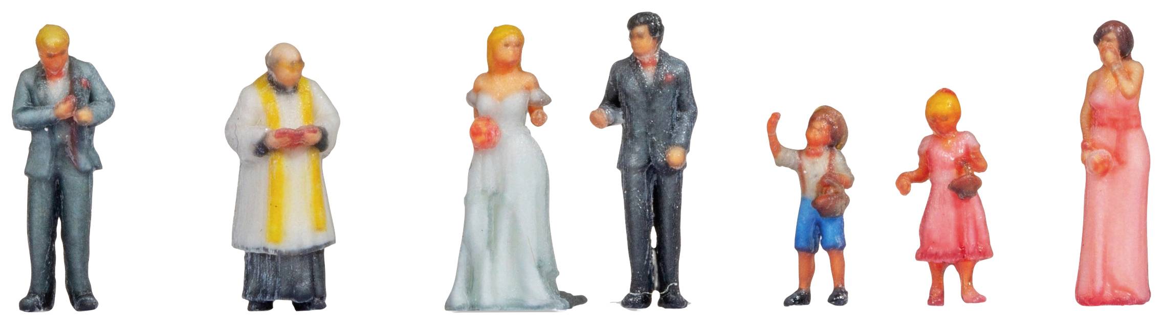 Male figure v poročni opravi: ženin, nevesta, duhovnik in gostje. Ženin v obleki, nevesta v beli obleki, otroci v sproščeni obleki.