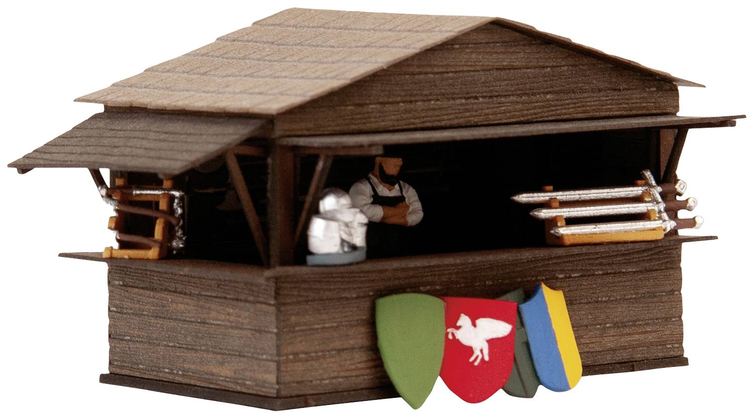 Miniaturna stojnica v srednjeveškem slogu z orožjem in oklepi. Spredaj ob leseni hišici se naslanjajo trije pisani ščiti.