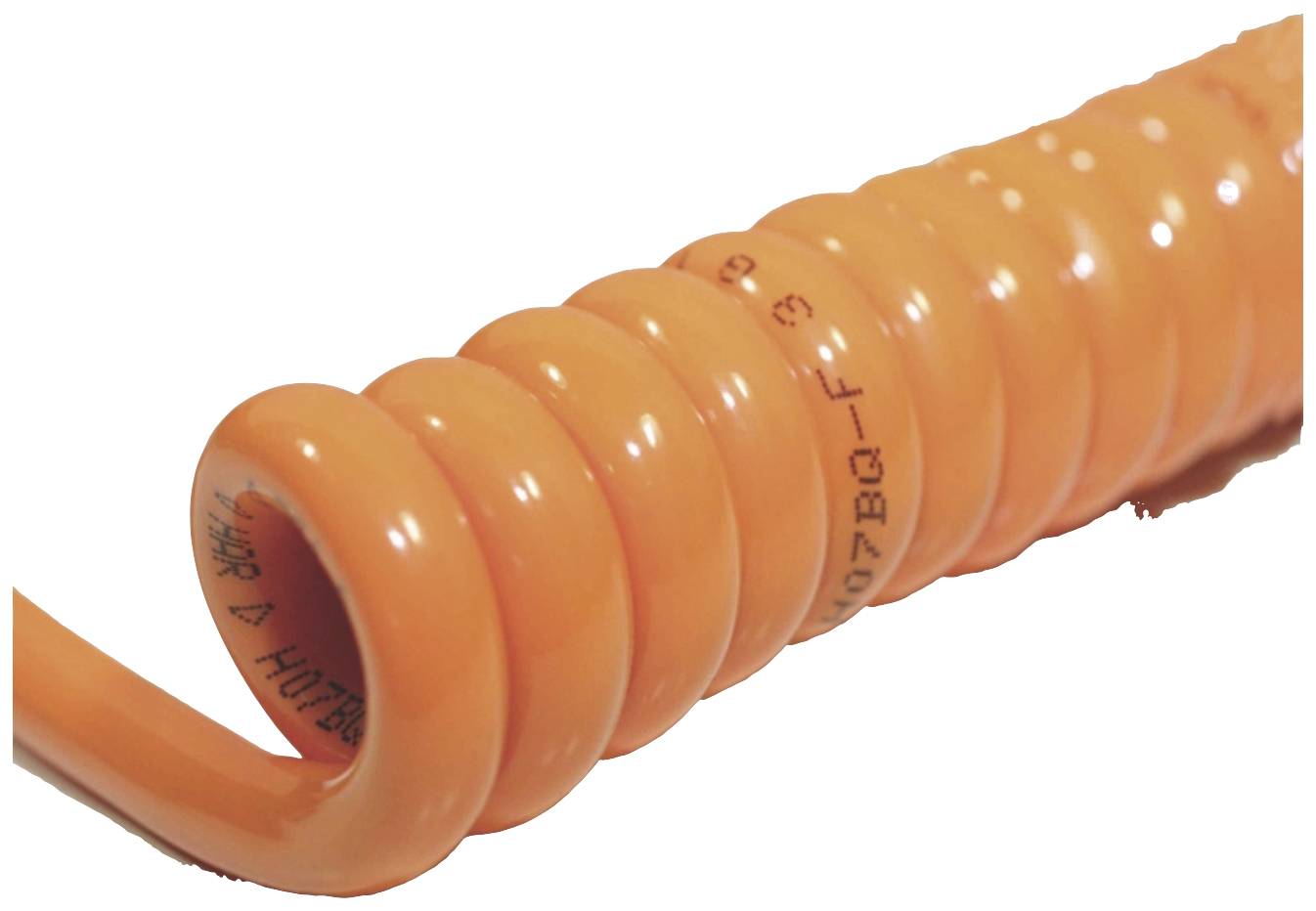 Oranžen, spiralen ovoj kabla, ki se vijično ovija. Besedilo in znaki so vidni vzporedno s spiralo.