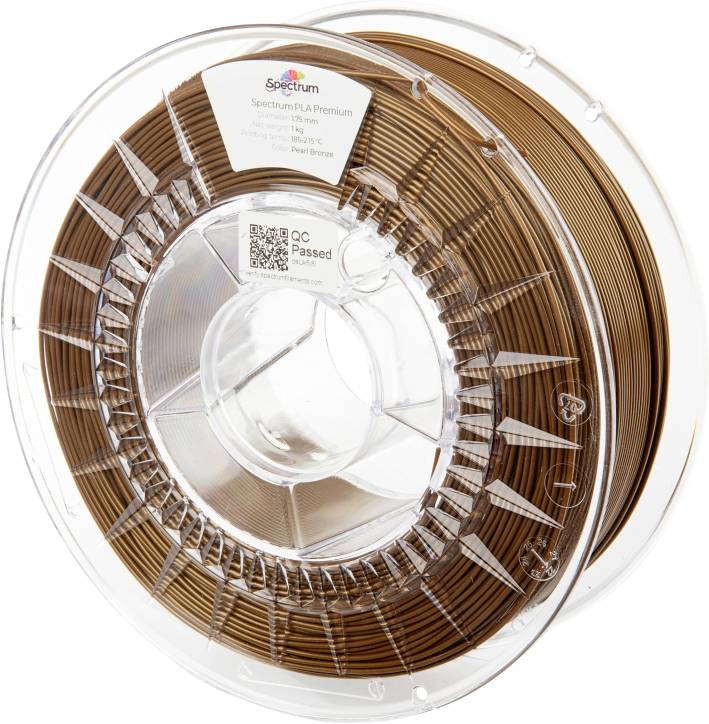 Kolut rjavega 3D-tiskalnega filamenta, označen kot 'Spectrum PLA Premium'. Kolut je prozoren in prikazuje filament.