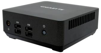 Kompakten črn računalnik znamke GIGABYTE z večimi USB priključki na sprednji strani in gumbom za vklop.