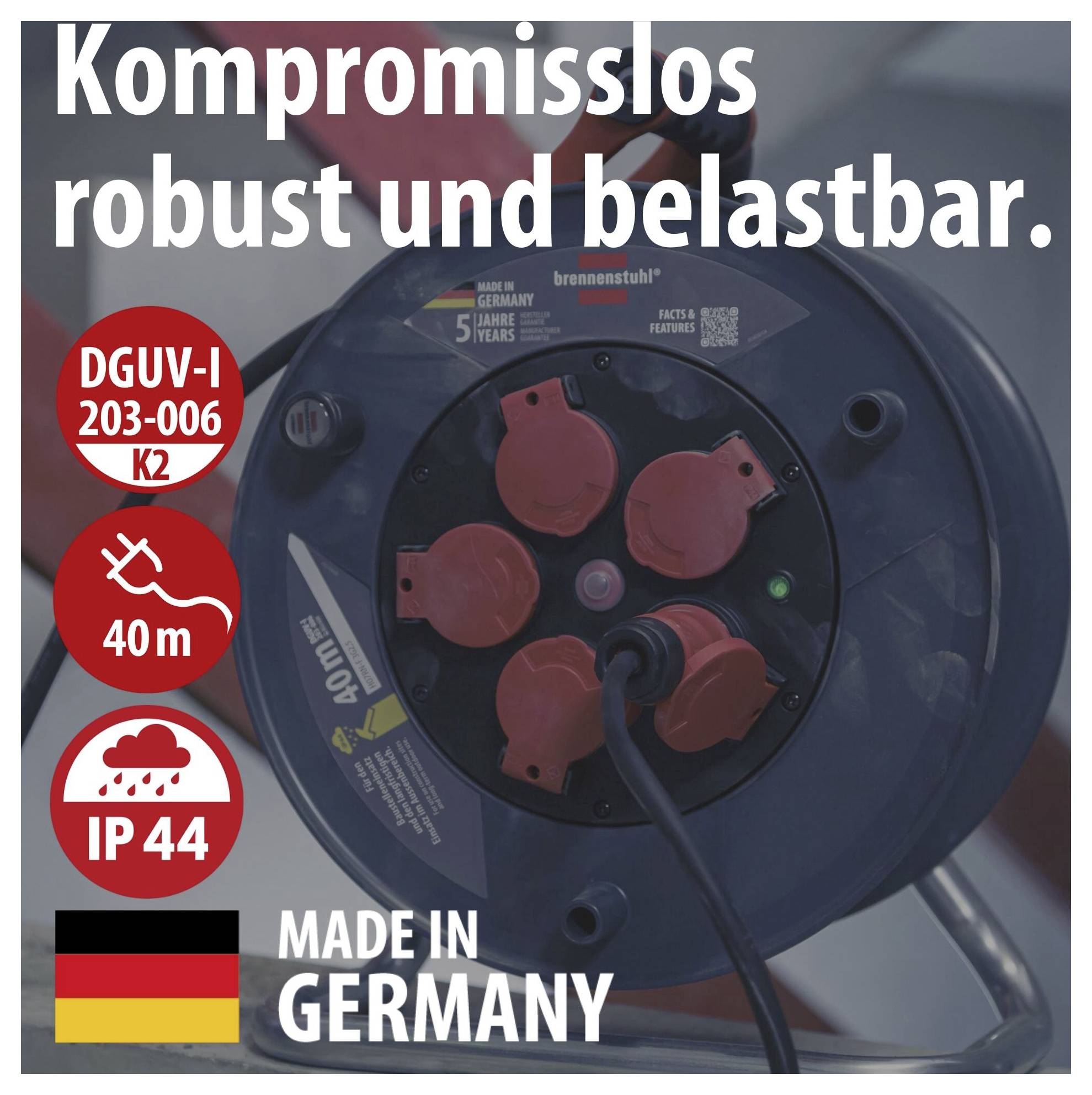 Oglaševalska slika modrega navijalnika s kablom in rdečimi vtičnicami, besedilo 'Nespopustljivo robusten in odljuden', DGUV-I 203-006 K2, 40 m, IP44, Made in Germany.