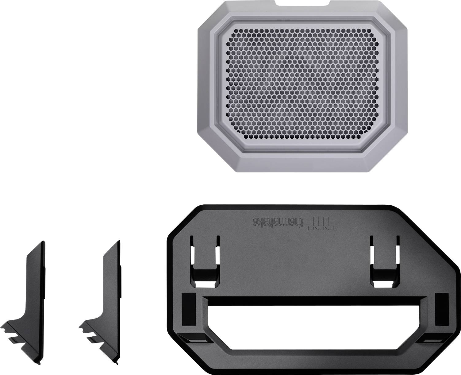 Srebrno šesterokotno mrežico zvočnika in dva črna plastična nosilca za namestitev elektronske naprave.