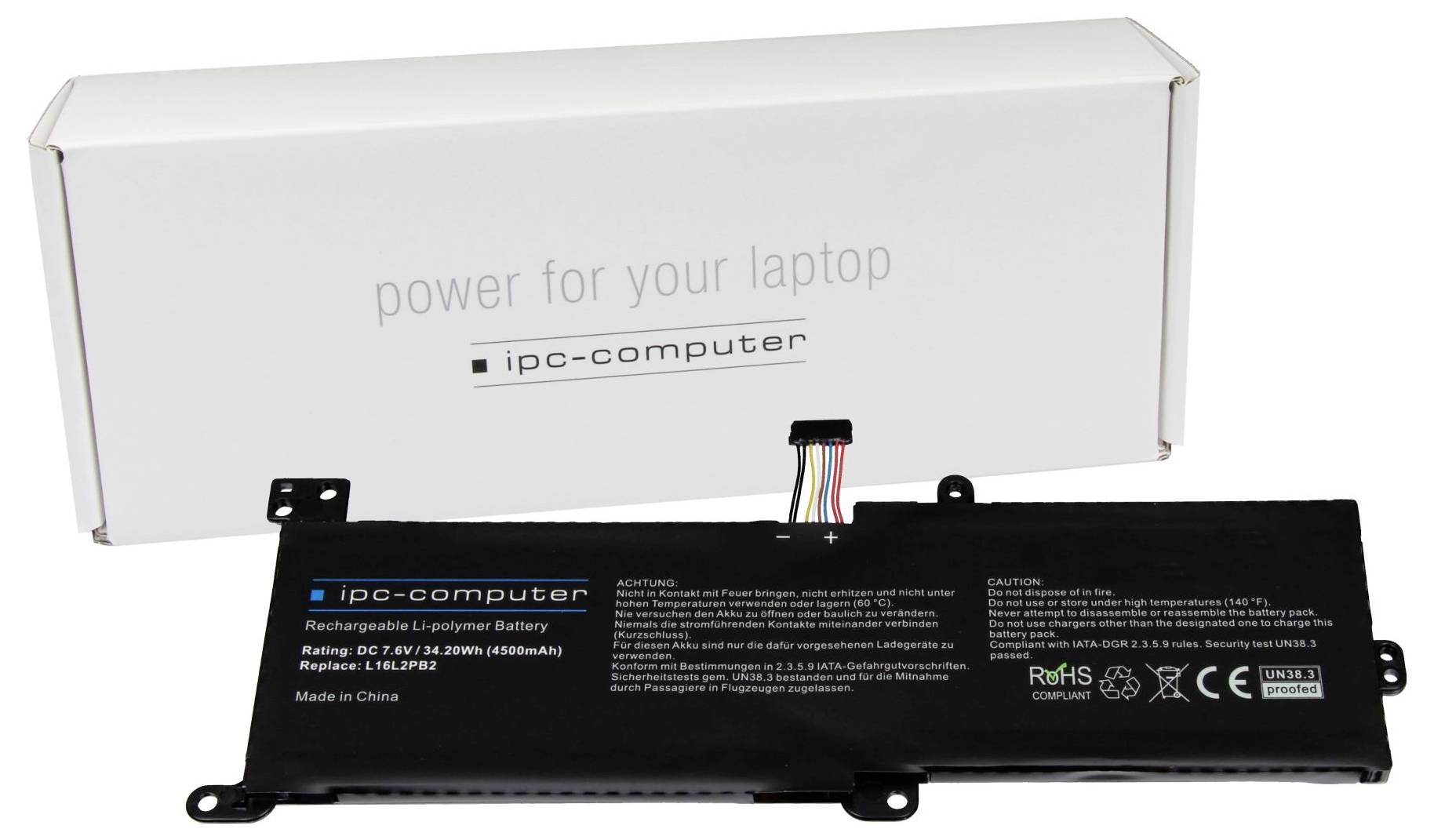 Prenosni računalniški akumulator podjetja IPC-Computer, ležeč pred embalažo z napisom: Napajanje za vaš prenosni računalnik. Navedena zmogljivost: 2600 mAh.