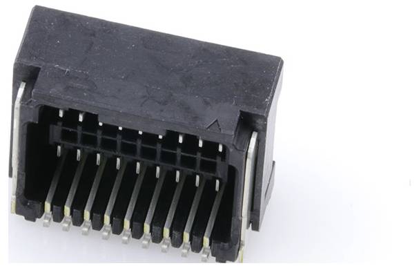 Črni elektronski priključek z večimi kovinskimi stiki, ki se uporablja za povezovanje elektronskih naprav.