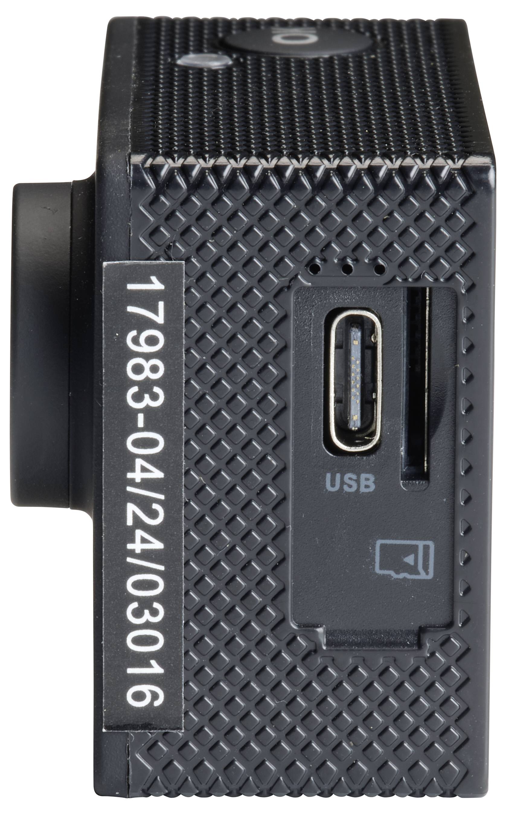 Črna akcijska kamera z USB priključkom na strani in serijsko številko '17983-04/2403016'.