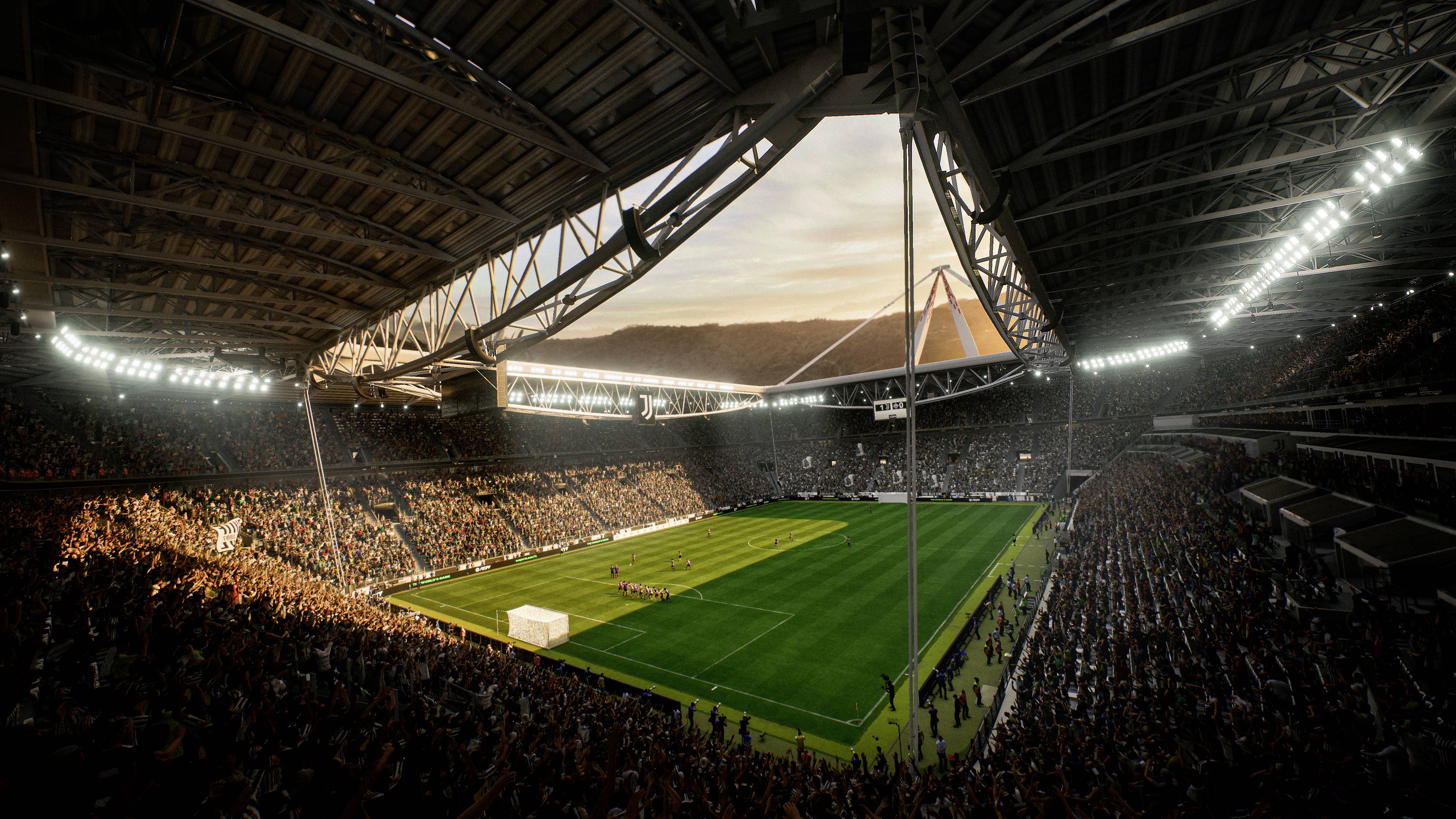 Popolnoma zasedeno nogometno stadion ob mraku, z briljantno osvetljenim igriščem in navdušenimi navijači na tribunah.