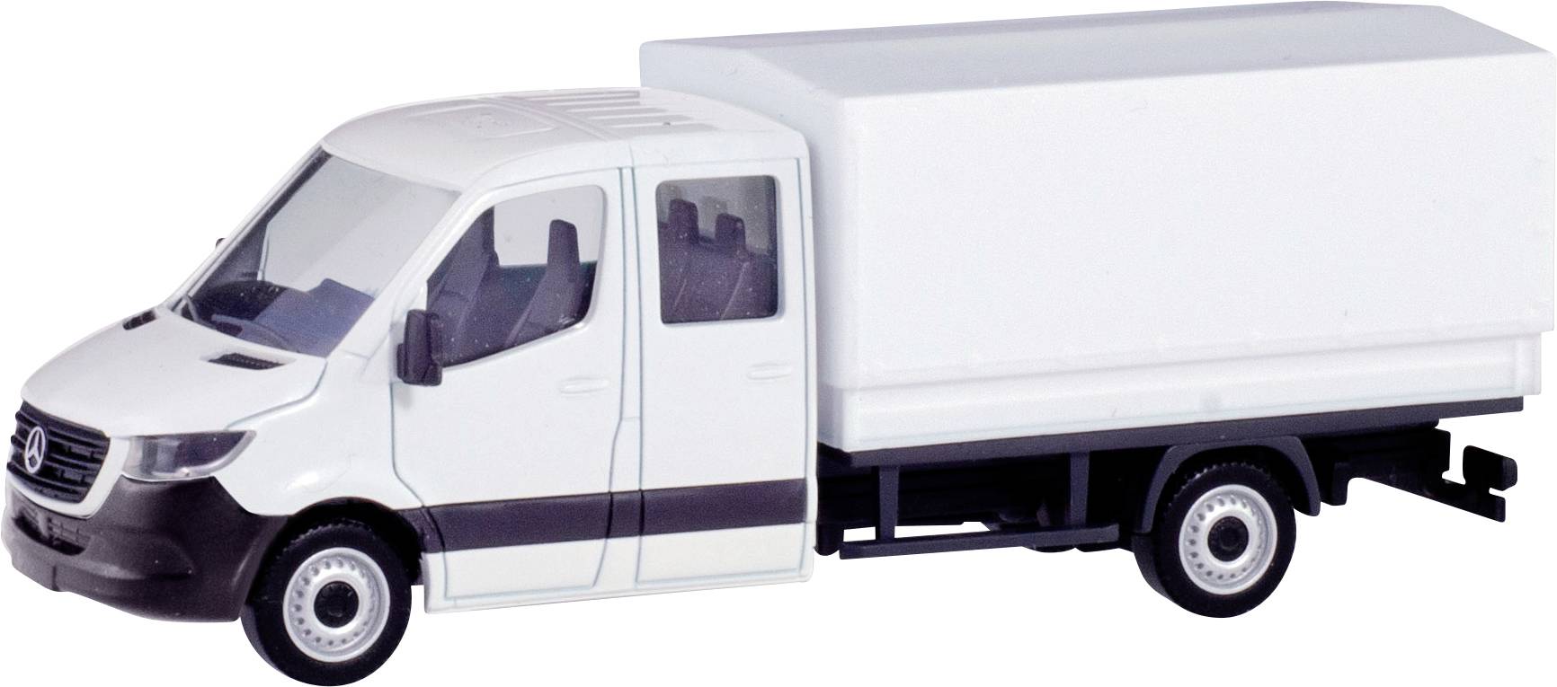 Bel miniaturni model tovornjaka s kastensko nadgradnjo, stranski pogled. Model avtomobila prikazuje tipične značilnosti transportnega vozila.