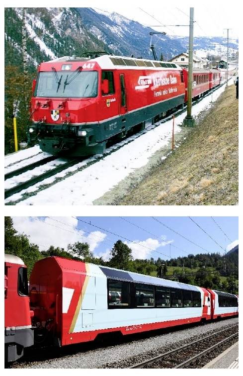 Rdeči parni vlak vozi skozi zasneženo gorsko pokrajino, za njim sledi vlak pri sončnem vremenu v hriboviti okolici.