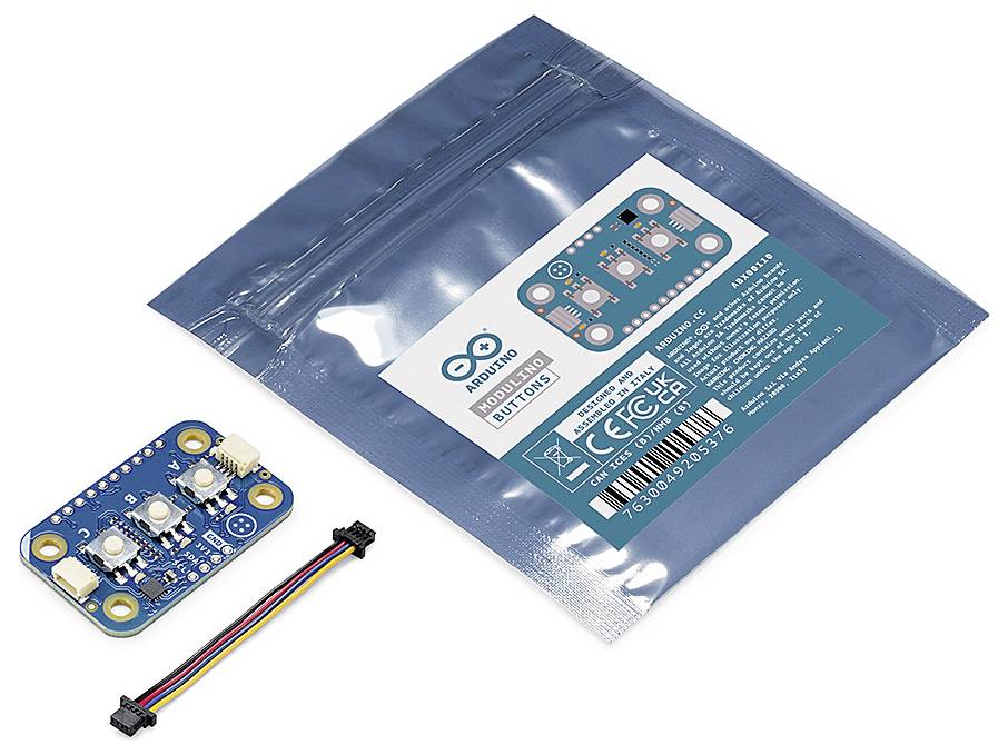 Arduino senzorska plošča s štirimi LED-diodami in priloženimi kabli. V ozadju embalaža z napisom 'Arduino Module'.