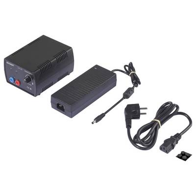 Napajalna enota in adapter s kabli, ki prikazujeta ameriško vtičnico, pripravljeni za povezljivost elektronskih naprav.