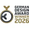 Logotip »Dobitnika nemške oblikovalske nagrade 2026« s stiliziranom, krožno oblikovanim zlatnim ikono na levi strani.