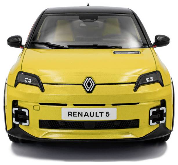 Rumena Renault 5, ki je prikazana od spredaj, z modernimi oblikovalskimi elementi in izstopajočim logotipom Renault na maski.