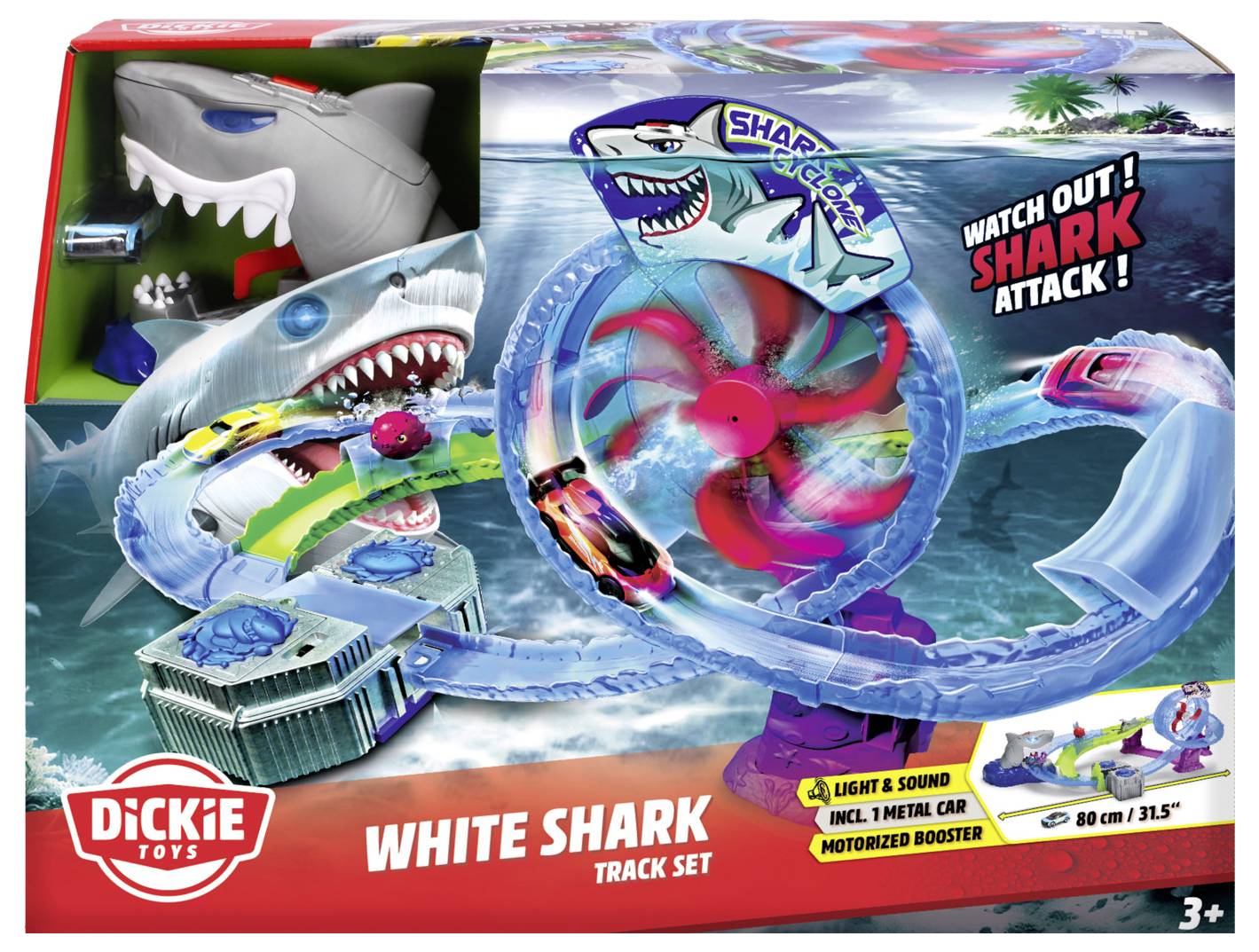 Škatla igrače 'White Shark Track Set' prikazuje dirkalno vozilo, ki drvi skozi zanko proge s figuro morskega psa. Besedilo pravi 'Pazi! Napad morskega psa!'. Vključuje svetlobne in zvočne učinke, primerno za otroke, starejše od 3 let.