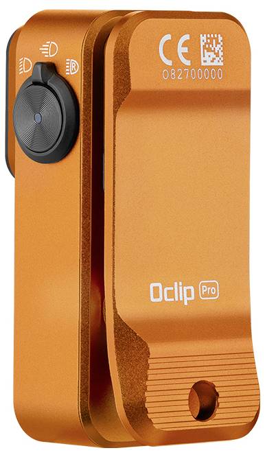 Oranžna naprava Oclip Pro s krožnim gumbom na boku in podrobnostmi o izdelku, vključno s certifikacijskimi znaki, na zgornji površini.