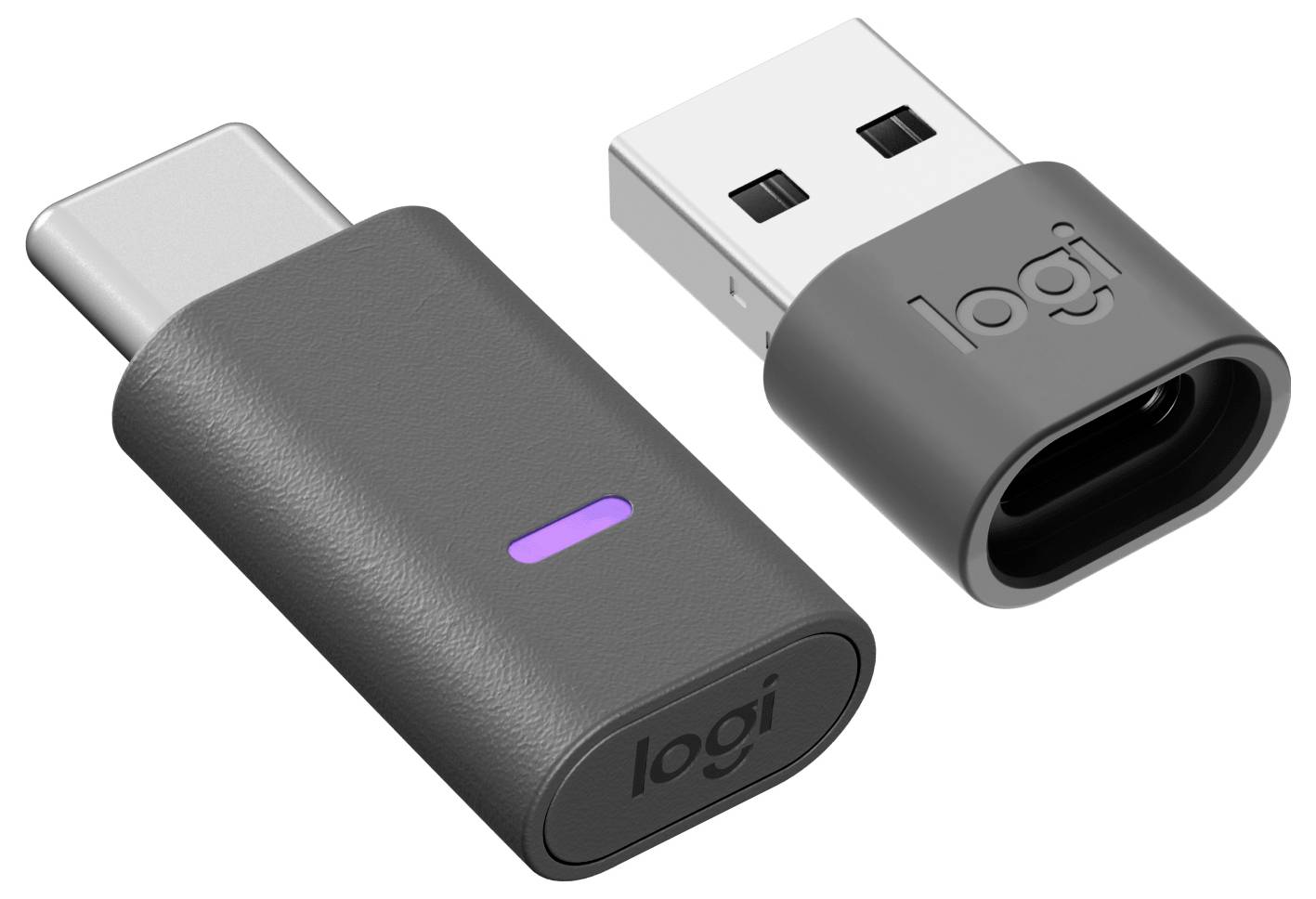 Dva brezžična USB ključa Logitech s črnimi ohišji; eden ima vijoličen indikatorni light.