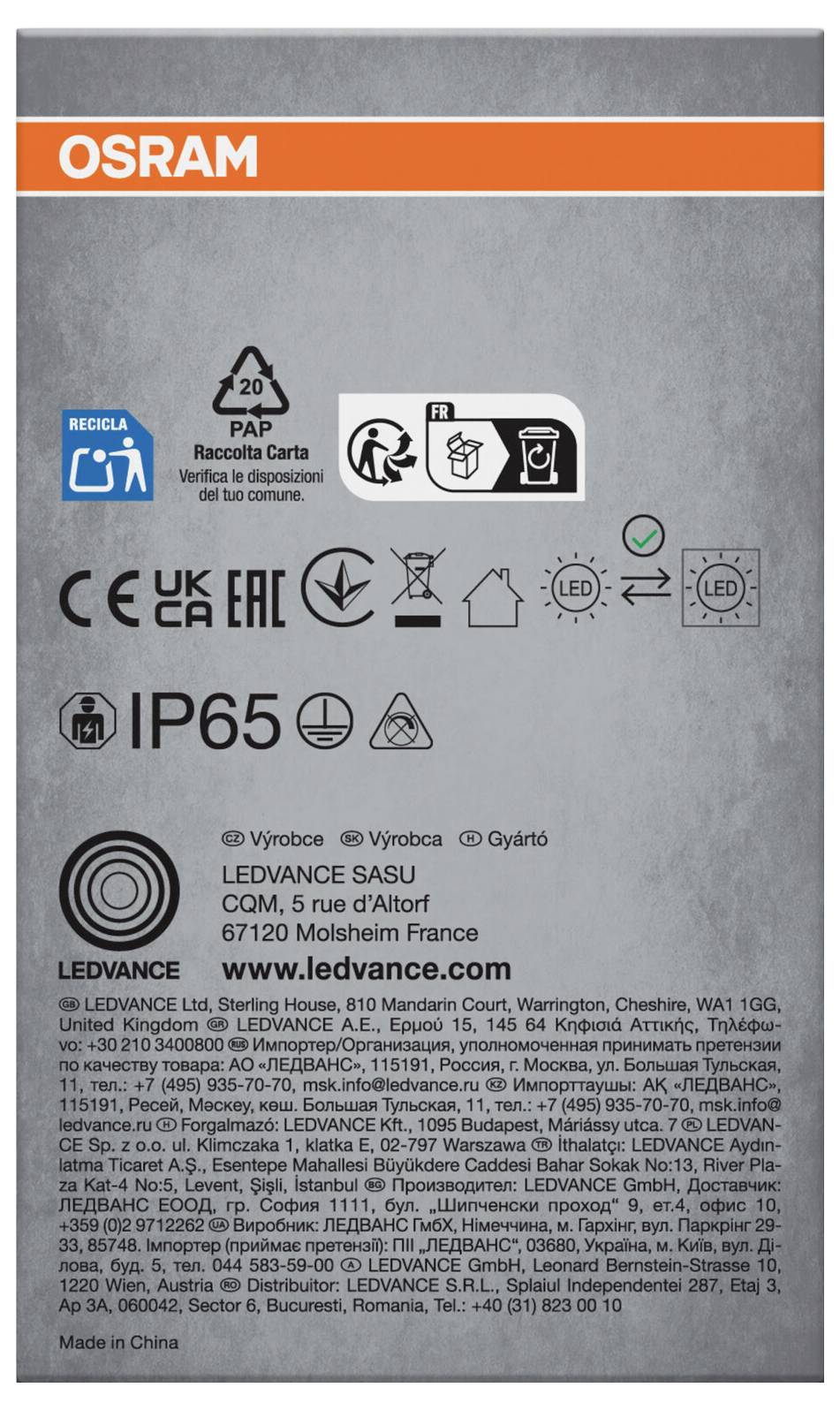 OSRAM LEDVANCE embalaža z oznako, ki prikazuje skladnost in ikone za recikliranje, oceno IP65, ime izdelka 'LEDVANCE SASU' in podatke proizvajalca.