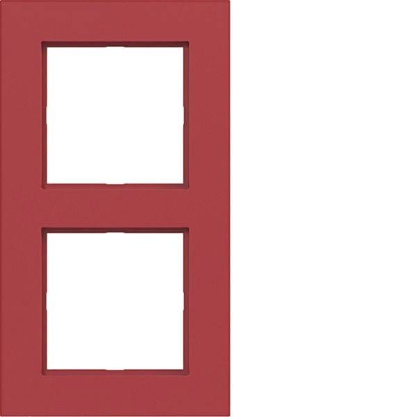 Rdeč pravokotni okvir z dvema praznimi belima kvadratnima odprtinama, zloženi navpično.