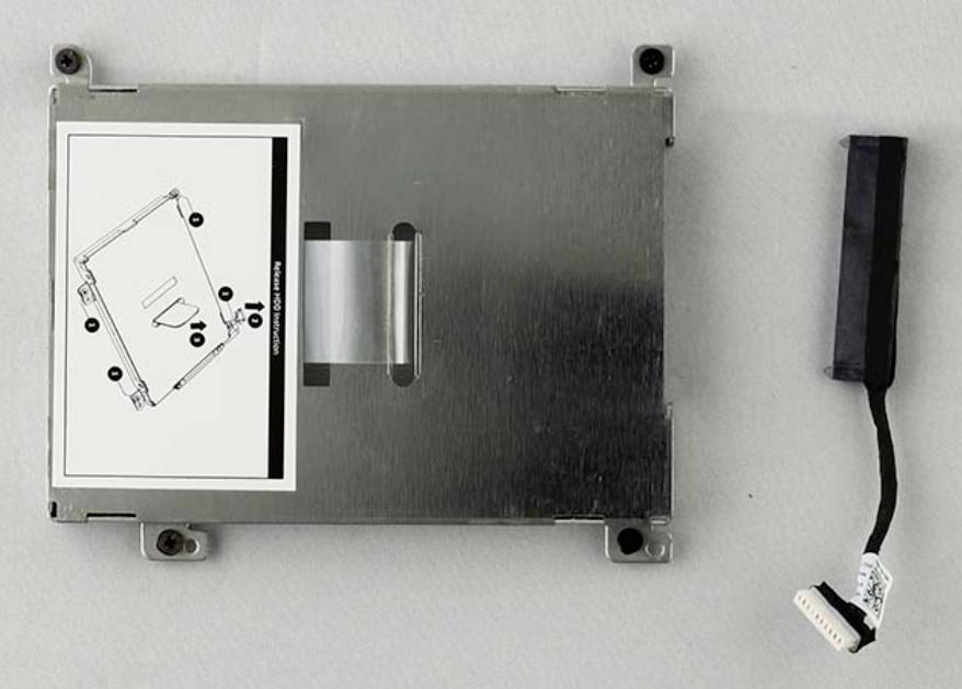 Kovinski elektronski modul z ročajem in nalepko z navodili, prikazan ob prekinjenem snopiču kablov na navadnem ozadju.